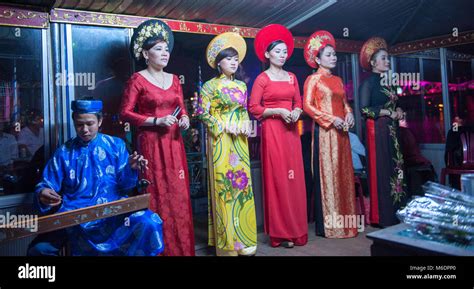 Vietnamese Traditional Singers On A Boat With Dan Tranh Traditional