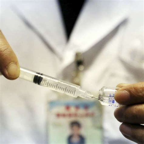 Chinese Official Linked To Companies In Two Vaccine Scandals Report