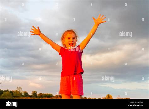 Girl With Open Arms Hi Res Stock Photography And Images Alamy