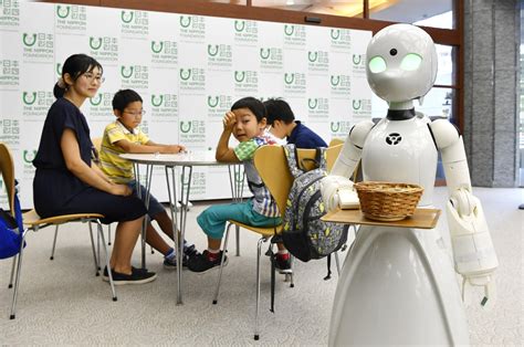 Café In Tokyo Uses Robot Waiters Controlled By Paralyzed People
