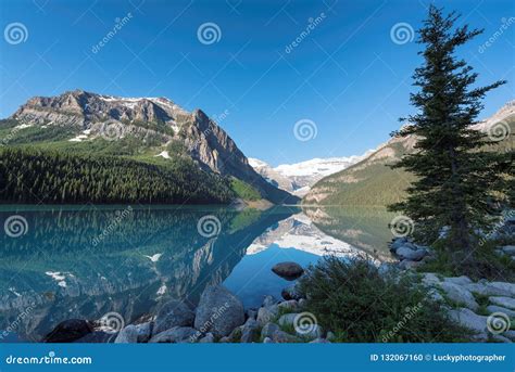 Lake Louise In Canadian Rockies Stock Photo Image Of Hiker Alpine