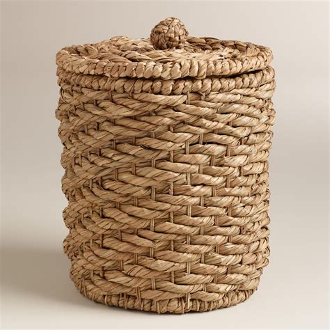 These lidded baskets give storage a beachy spin, with strips of recycled plastic wrapped around coils of neutral seagrass. Natural Water Hyacinth Lidded Round Ava Basket | Water ...