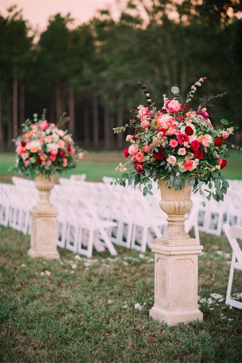 A pedestal table like this is the perfect place to perch a floral arrangement in a hallway, entrance, or. The 25 Wedding Flower Arrangements You'll Probably Need on ...