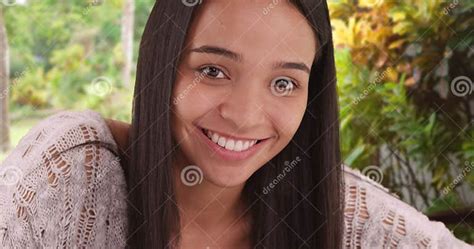 cute latina girl smiling at camera stock image image of camera brunette 79388877