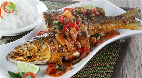 Hidangan ikan yang dibakar, muncul secara universal di berbagai belahan dunia. Resep Bandeng Bakar Sambal Taoco