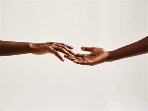 Two Hands Reaching Out Stock Photos Pictures And Royalty Free Images