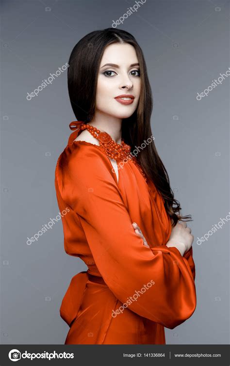 Gorgeous Young Woman Stock Photo By ©smmartynenko 141336864