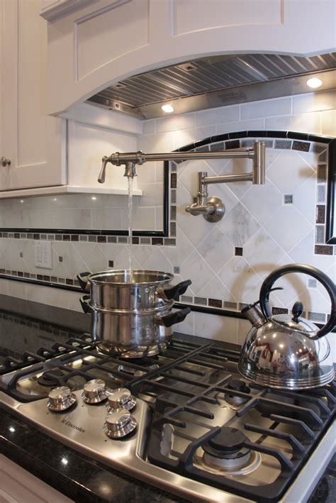 When selecting a backsplash it is important to have it match the fixtures in your kitchen, but not the appliances since they will. 1000+ images about Pot Filler Frenzy on Pinterest | Wall ...