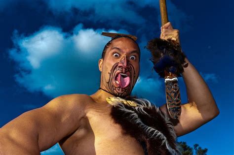 Maori People Maori Warrior With A Ta Moko Facial Tattoo Performs A War Haka Maori