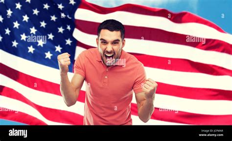 Angry Man Showing Fists Over American Flag Stock Photo Alamy