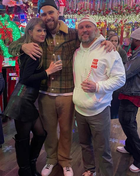 Taylor Swift And Travis Kelce Get Cozy At Christmas Themed Bar After