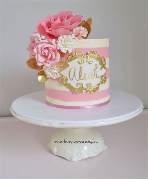 White And Pink Buttercream Striped Cake With A Hand Painted Name Plaque