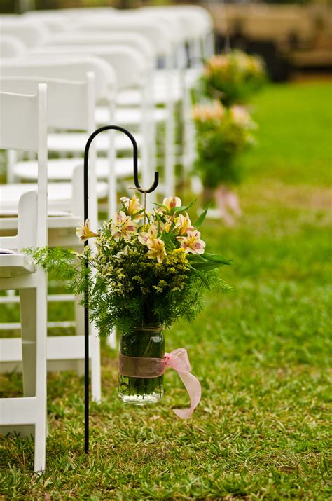 Center Aisle Shepherds Hooks With Mason Jars And Wildflowers Our