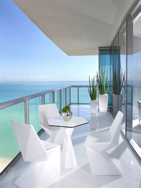Gorgeous Beach High Rise With Glass Patio Contemporary White
