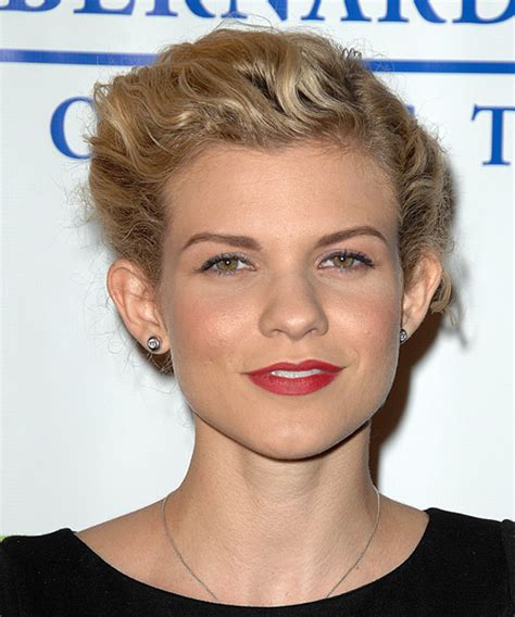 There are four types of haircuts: Angel McCord Curly Casual Updo Hairstyle