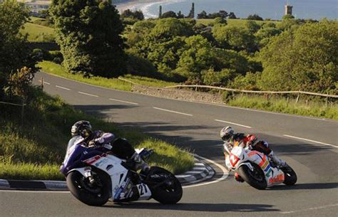 Camera man reaction to crazy insane footage isle of man tt sidecars flat out speed through milltown. Boxing safe compared to TT's wall of death