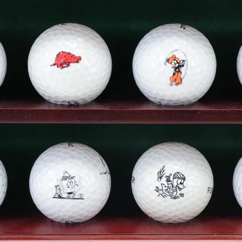 Collection Of Novelty And Souvenir Golf Balls In Wood Display Case Ebth