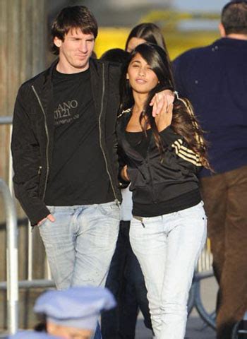 Lionel messi and wife antonella roccuzzocredit: Lionel Messi's fiancee Antonella Rocuzzo - PlayerWives.com