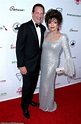 Joan Collins, 85, brings the glamour in a sparkling silver gown with ...