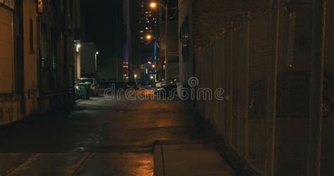 Establishing Shot Of A Dark Alleyway At Night Stock Footage Video Of