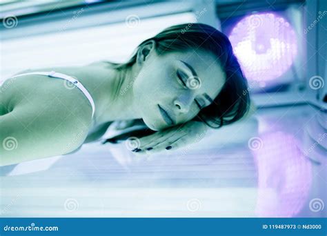 beautiful brunette sunbathing in solarium stock image image of lying healthcare 119487973