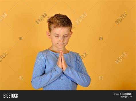 Boy Prays Kneeling Image And Photo Free Trial Bigstock