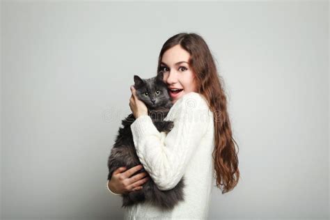 Young Woman Holding Cat Stock Photo Image Of Background 104954654