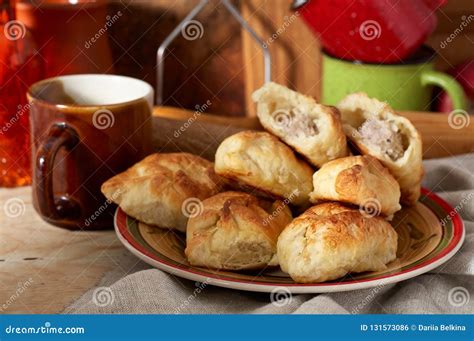 Russian Meat Piroshki Traditional Hand Mini Pies On Wooden Background