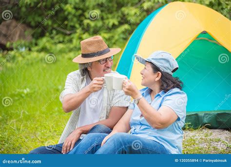 Retired Couple Drinking Coffee At Camping Site Stock Photo Image Of
