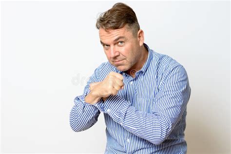Middle Aged Man Making A Fist At The Camera Stock Photo Image Of Looking Senior