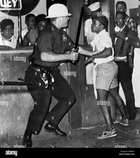 Harlem Race Riots 1964 Na Policeman Confronts A Group Of African