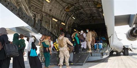 The Crew Of A C 17 Clears The Aircraft After Civilians Clinging To It
