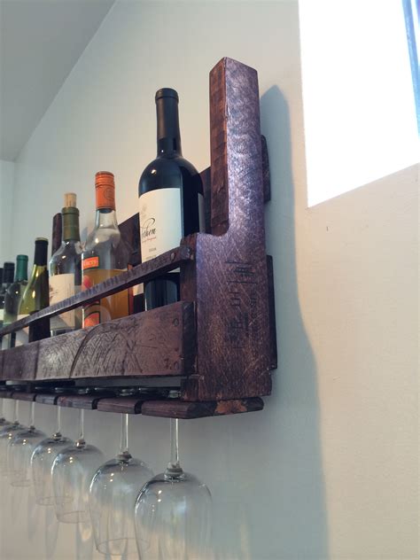 This is how to build a wine rack out of pallet wood. Handmade wine rack by yours truly out of busted knuckle ...