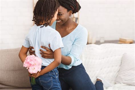 Black Woman Apologizing To Her Grumpy Child Stock Photo Image Of