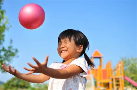 Girl Catching Ball Stock Photos Pictures And Royalty Free Images Istock