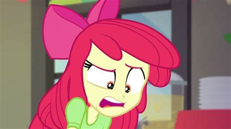 The Pinkie Is Looking At Something In Front Of Her Face And Has An