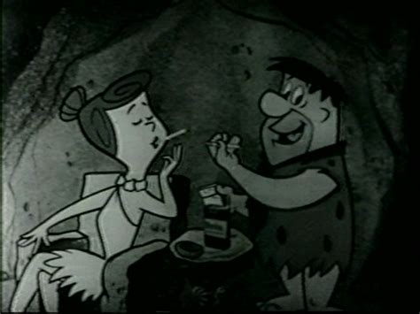 Fred Flintstone And Wilma Flintstone Smoking With Winston Cigarettes By