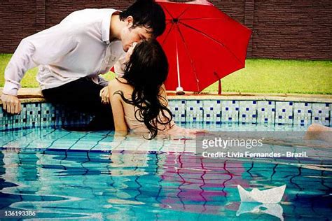 Couple Kissing Swimsuit Photos And Premium High Res Pictures Getty Images