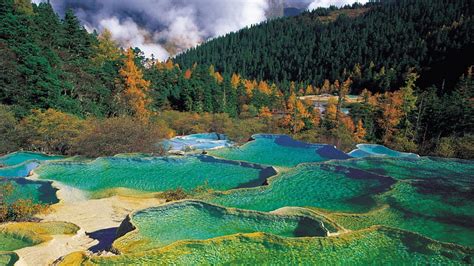 Gorgeous Pools In Huanglong Preserve China Forest Rocks Formation