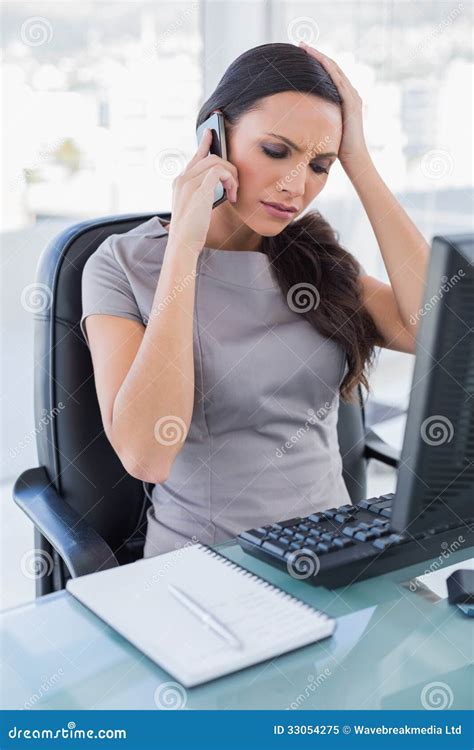 Worried Gorgeous Businesswoman Having A Phone Call Stock Image Image