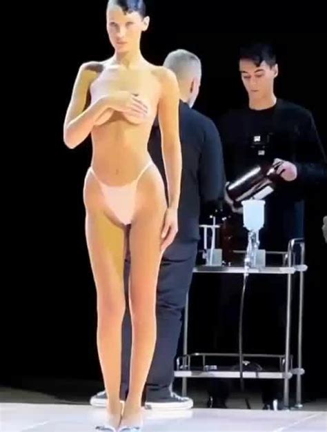 Bella Hadid Gets Dress Spray Painted On Half Nude Body At Runway Nude