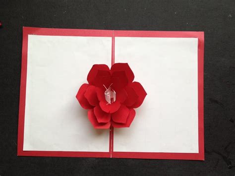 Get mod podge or another clear craft sealant and use a paintbrush to paint it over the front of the card. Easy To Make A 3D Flower Pop-Up Paper Card Tutorial & Free Pattern - Everything 4 Christmas