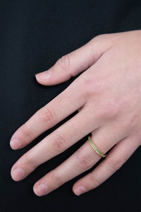 Front Emerald Eternity Band Yellow Gold Kick Pleat