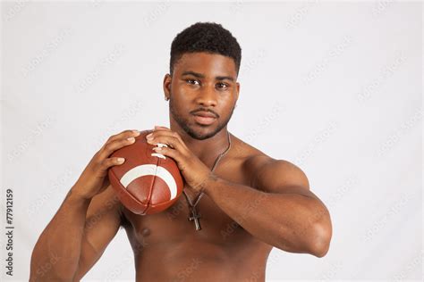 Shirtless Black Man Throwing A Football Stock Photo Adobe Stock