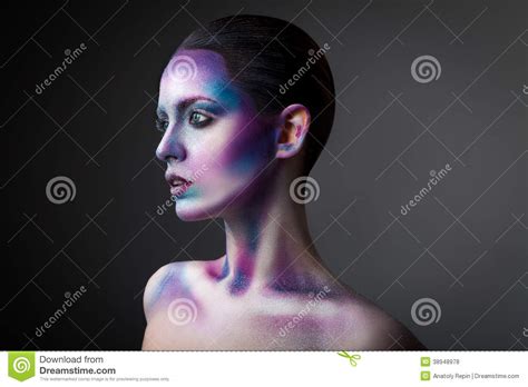 Young Woman With Creative Face Paint Portrait Stock Photo