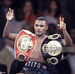 Felix Trinidad of Puerto Rico flashes the V-sign as he wears the ...