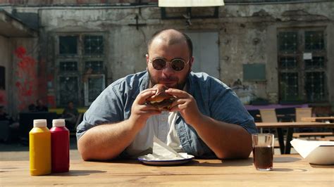 Royalty Free Stock Footage Overweight Fat Man Eating Burger Hd Youtube