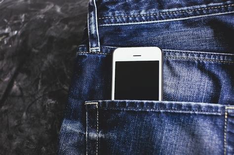 Premium Photo Smartphone In The Jeans Pocket
