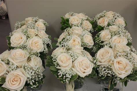 White Roses And Babys Breath Bouquets For Bridesmaids White Wedding