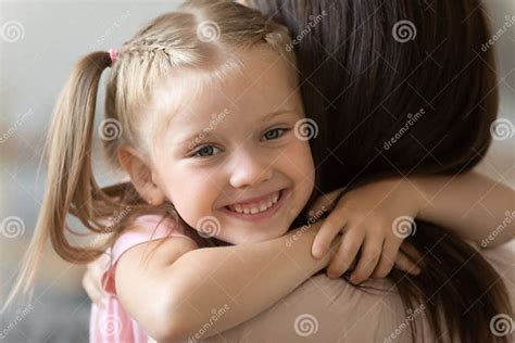 Cute Little Girl Hug Mom Showing Love Stock Photo Image Of Laughter